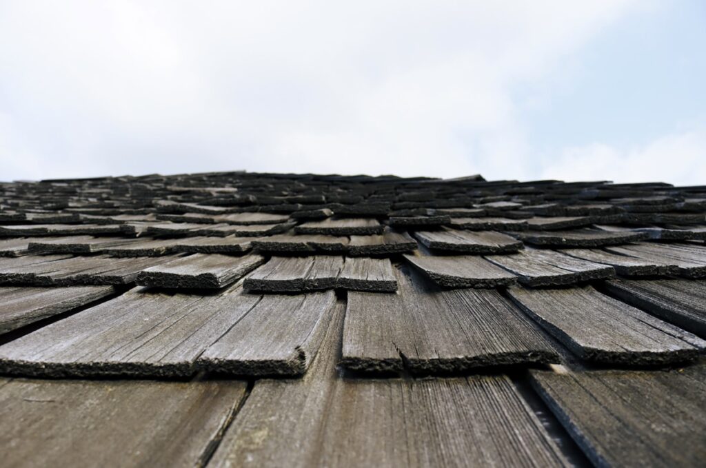 Roof showing hail damage to shingles requiring repair